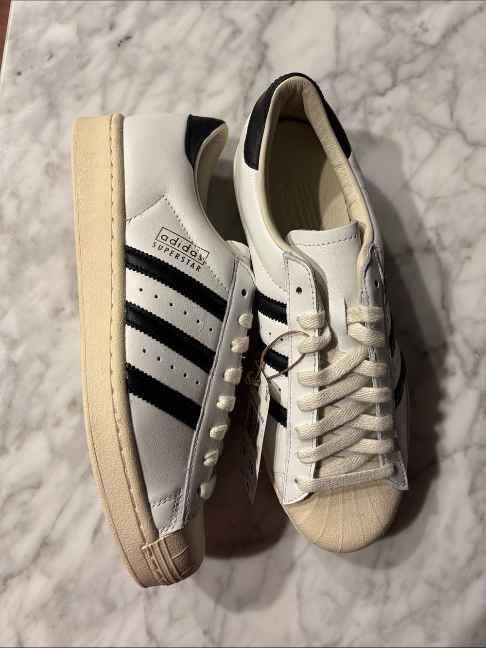 adidas White and Black Superstar Vintage Sneakers